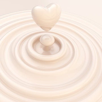 Heart symbol made of liquid milk cream
