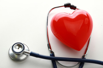 A heart with a stethoscope, isolated on white background