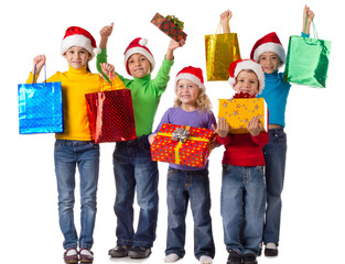 Group of happy kids with christmas gifts