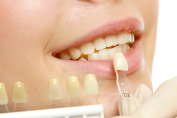 Examining patient's teeth