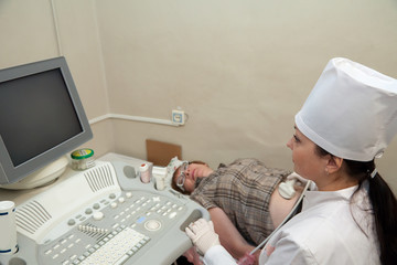  doctor making ultrasound investigation