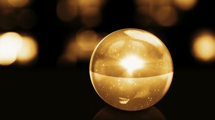 golden glass ball with snow and light - Powered by Adobe