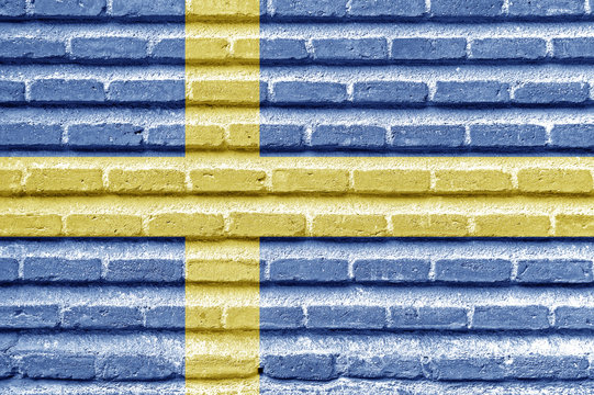Sweden flag on an old brick wall