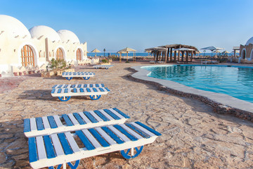 Obraz premium Bungalows and pool