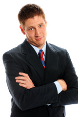 Handsome Business Man With Arms Crossed Glaring