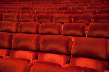 Fototapeta premium red velvety armchairs