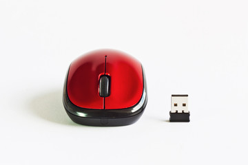 A red mouse on white table