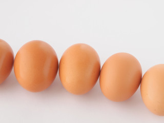 brown eggs isolated on white background