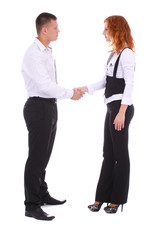 Pretty caucasian business woman shaking hands with a man