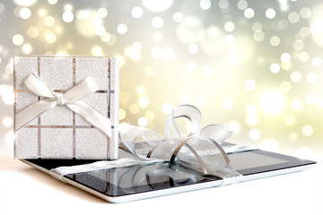 Digital tablet with christmas present