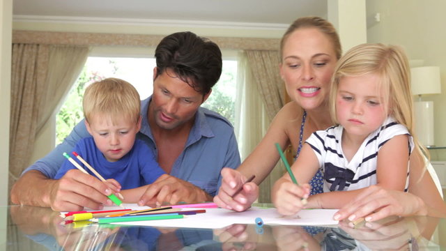 Family Drawing Picture Together At Home