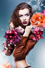 pretty attractive erotic woman in brown jacket with big flowers