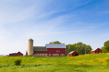 Traditional American Red Barn With Blue Sky