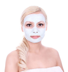 clay mask on beautiful blonde girl isolated