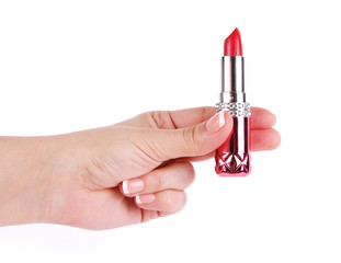 red lipstick in hand isolated on white background