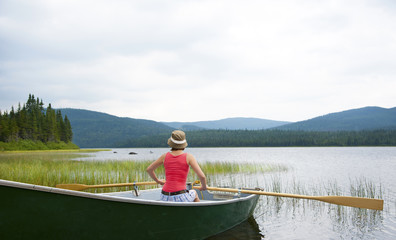 Female canoeing on Lake Noel in Quebec