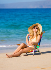 Beautiful Woman Relaxing on the Beach