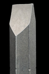 Flat Screwdriver Bit Close-Up on Black Background
