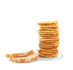 Pile of crackers and bread isolated on white with copy space.