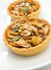 cup cake , caramel nuts tart
