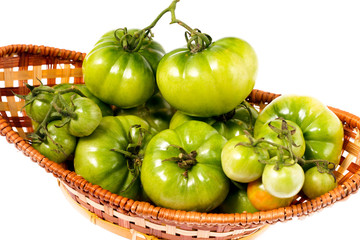 Green tomatoes in the basket