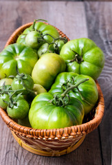 Green tomatoes in the basket