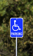 Worn handicapped parking sign