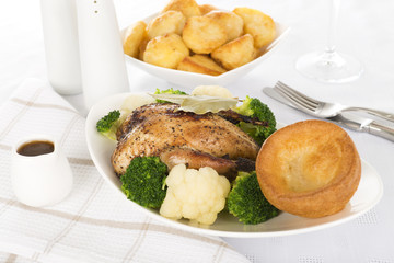 Roast Dinner - Partridge, Yorkshire pudding, gravy & potatoes.