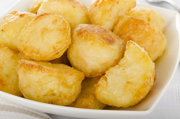 Roast Potatoes - White potatoes roasted with garlic in goose fat