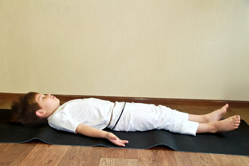 Fototapeta na wymiar Baby yoga at home