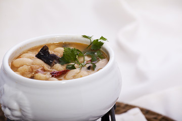 beans cooked with mushrooms and quail