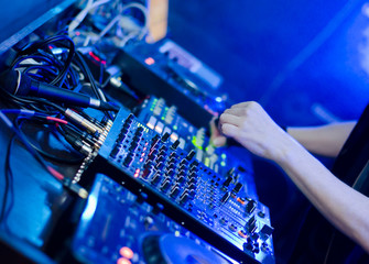 DJ set: DJ hands and DJ desk