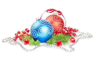 Two christmas balls with pine and decorations