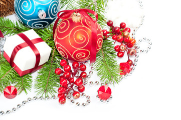 Two christmas balls with pine and decorations