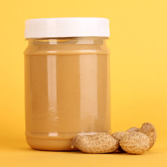 Delicious peanut butter in jar of peanut near