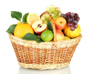 Assortment of exotic fruits in basket, isolated on white