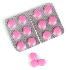 Pills packed in blister isolated on white