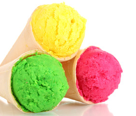 Three scoops of lemon, strawberry and kiwi ice cream in the