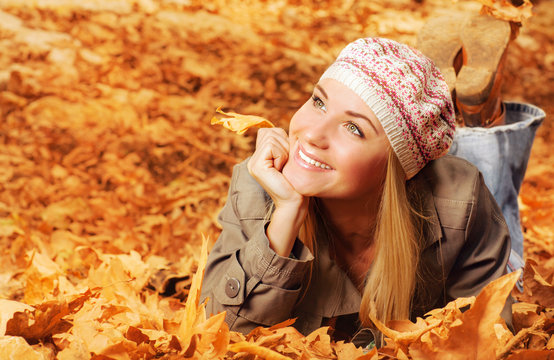 Cheerful Teen On Fall Foliage