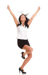 Woman clenching arms in excitement