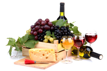 bottles and glasses of wine, assortment of grapes and cheese