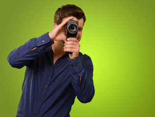 Young Man Holding Old Camera