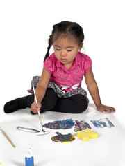 girl busy painting