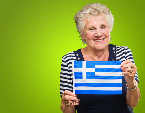Happy Senior Woman Holding Greece Flag