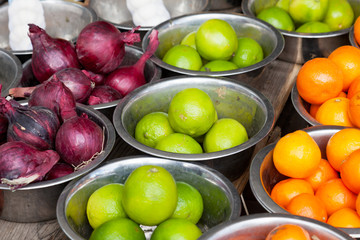 Sale of vegetables and fruit in bowls in the market