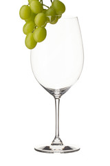 grapes on empty wine glass