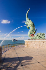 Naklejka premium Head great parent NAK statue spray water at Songkhla Thailand