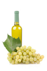 White wine bottle and grapes