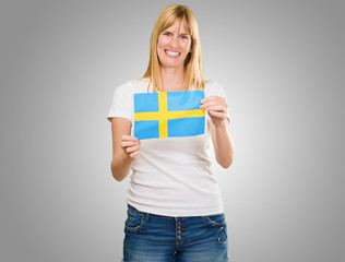 Happy Woman Holding Swedish Flag