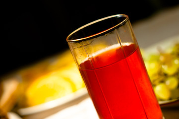 Red fruit drink in glass